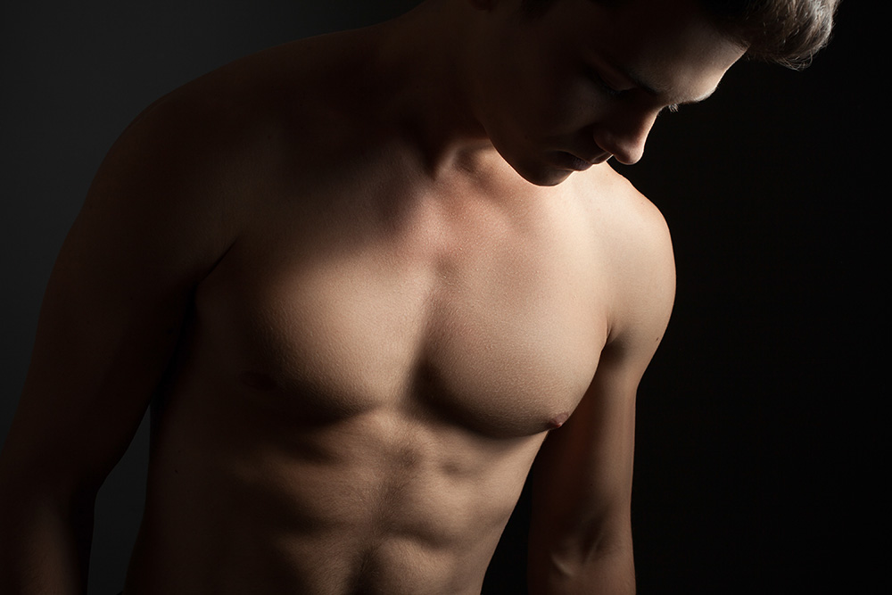 SculpSure treatment being applied to a man's chest to reduce unwanted fat